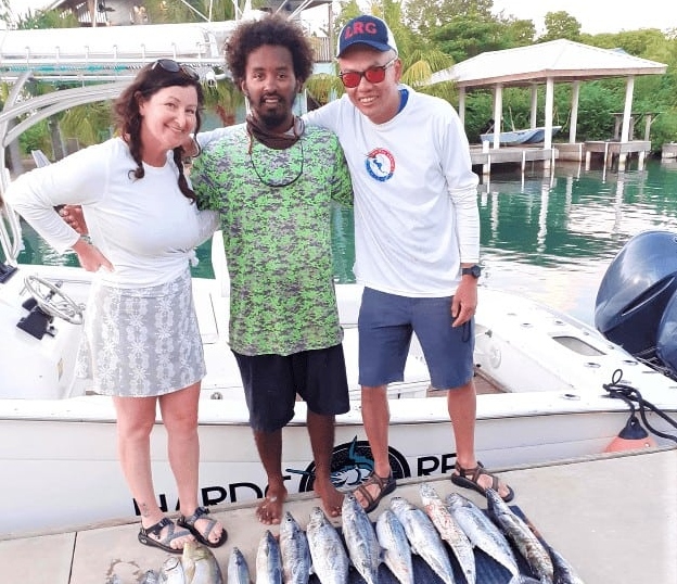 CAF clients and their catch after reef fishing in Belize