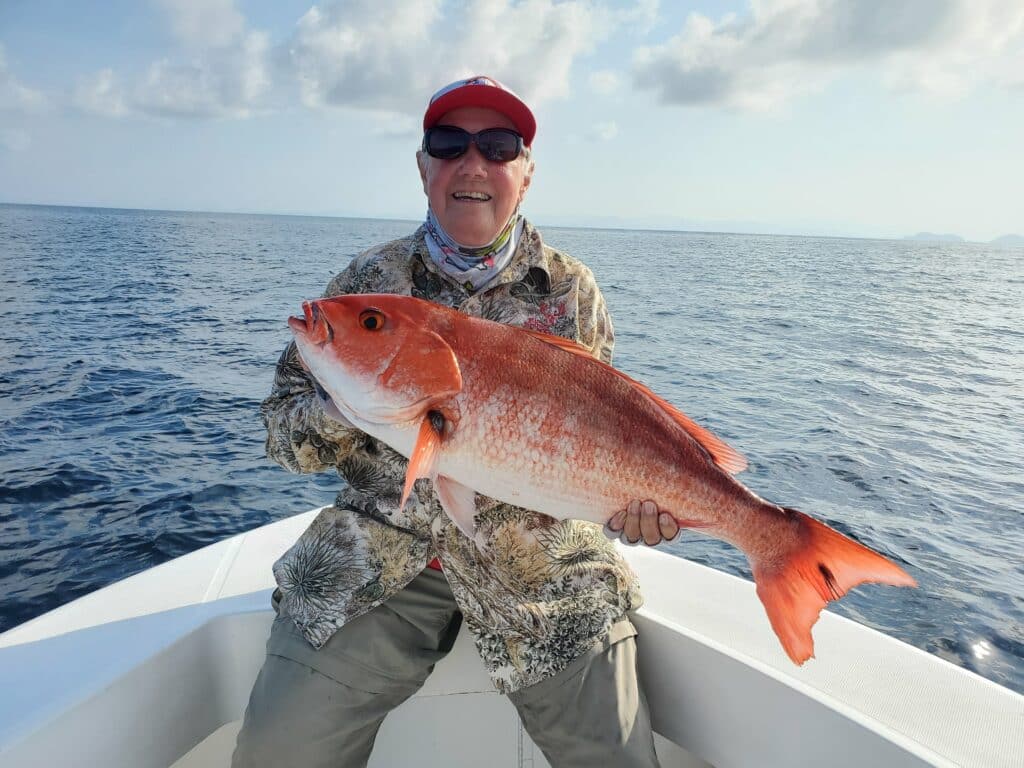 Virginia and a big silk snapper. She was convinced this was a world record for two days.