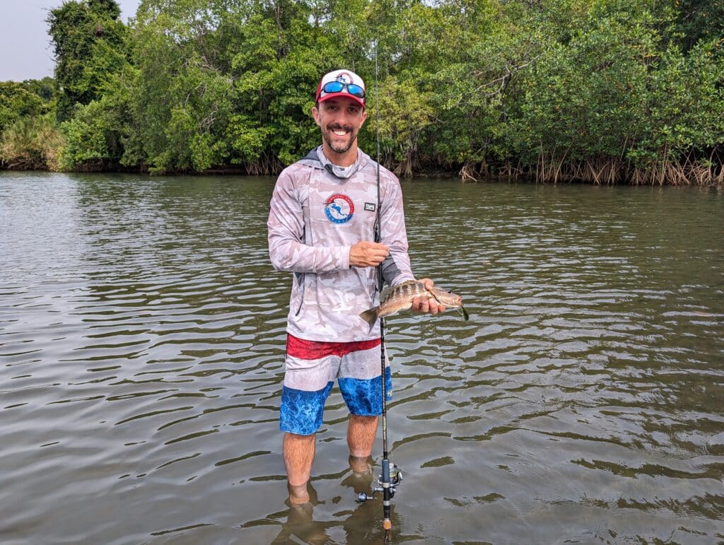 CAF owner Chris Atkins with a mangrove snapper in Coiba Island National Park