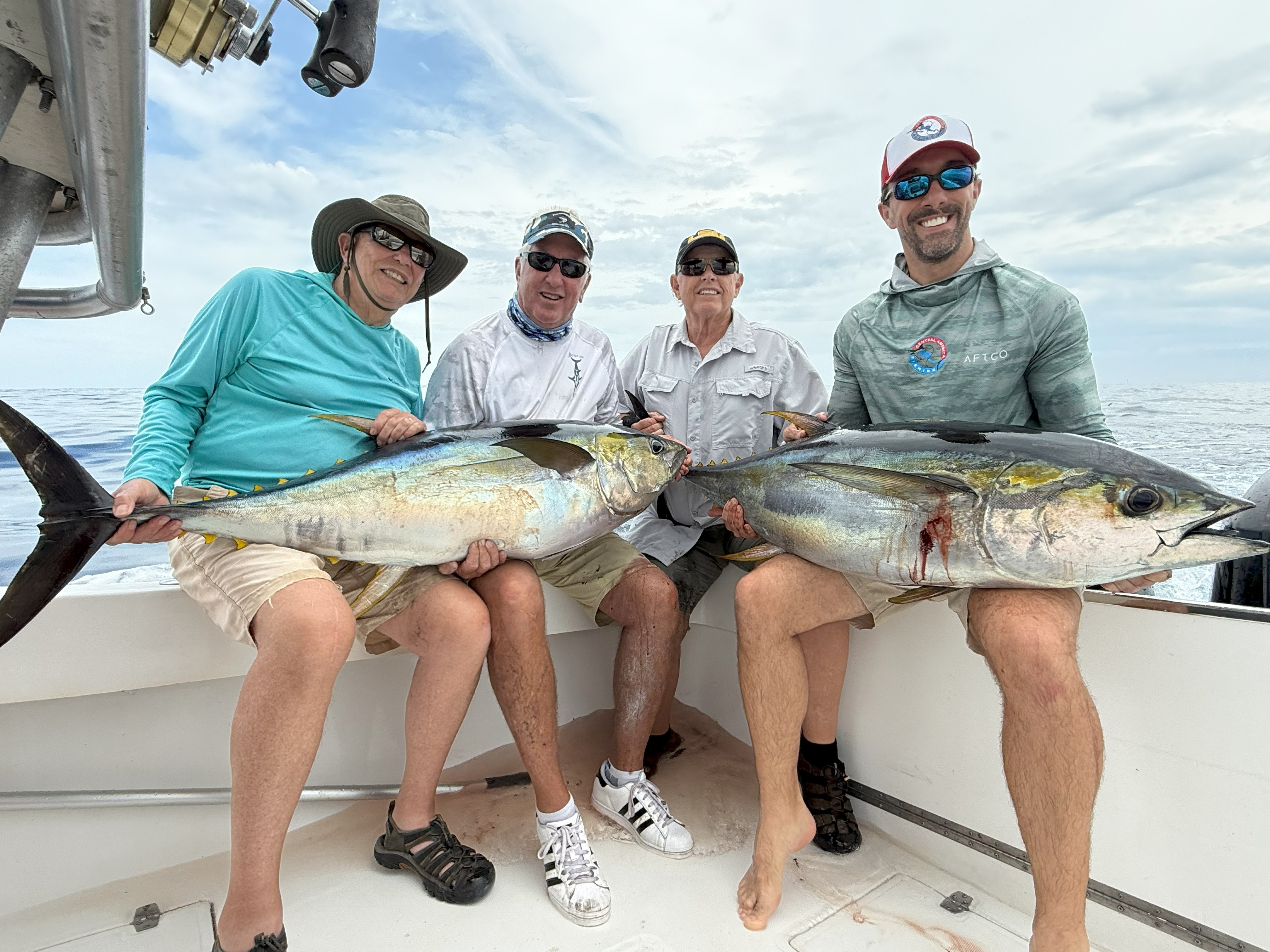 Central America Fishing owner, Chris Atkins, and his clients with tuna in Panama