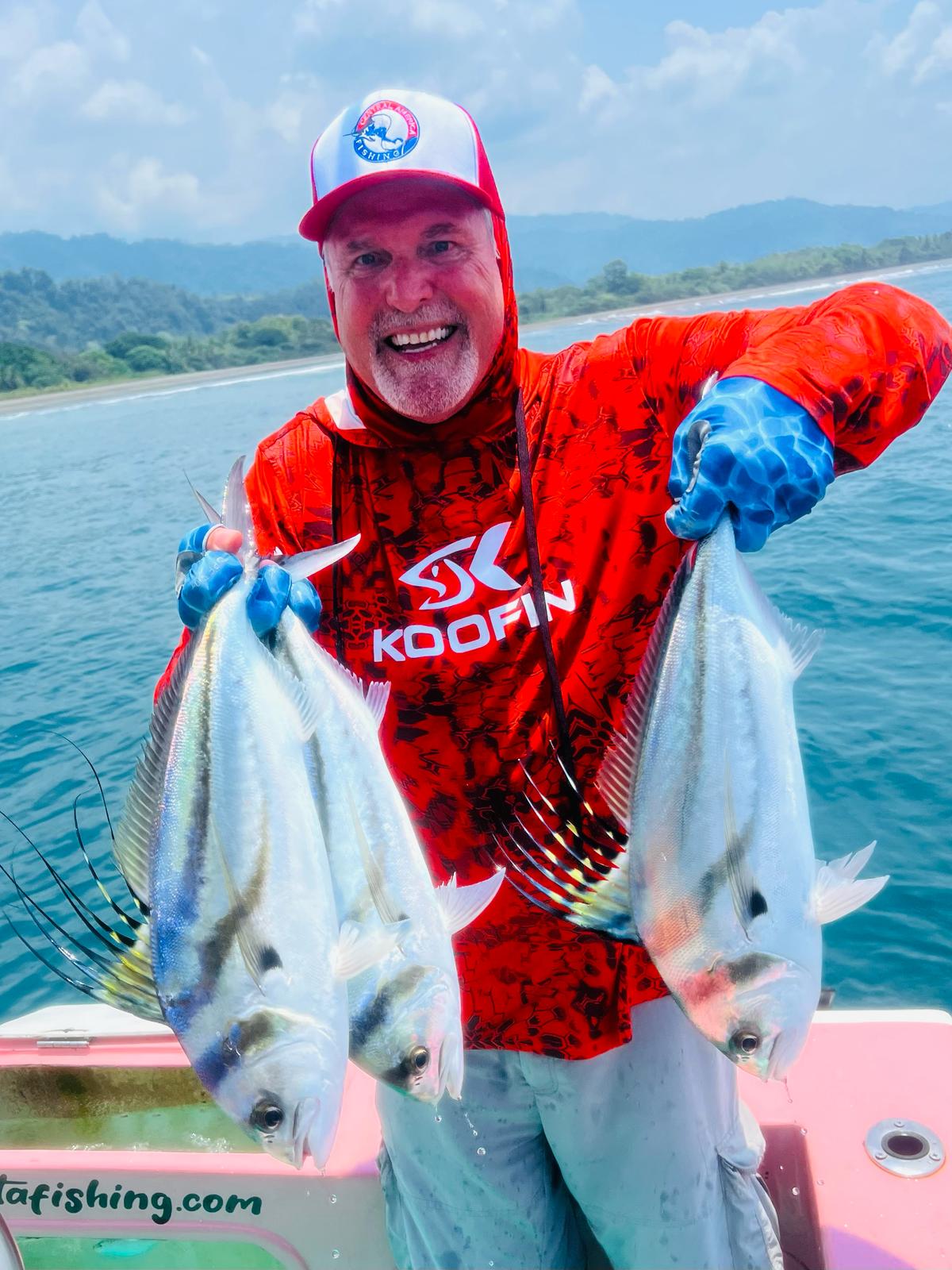 Central America Fishing repeat client, Mark Jacobs, with three roosterfish at one time!