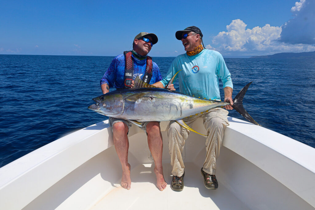 CAF anglers Tim & Jeff share a moment after landing another big tuna in Panama