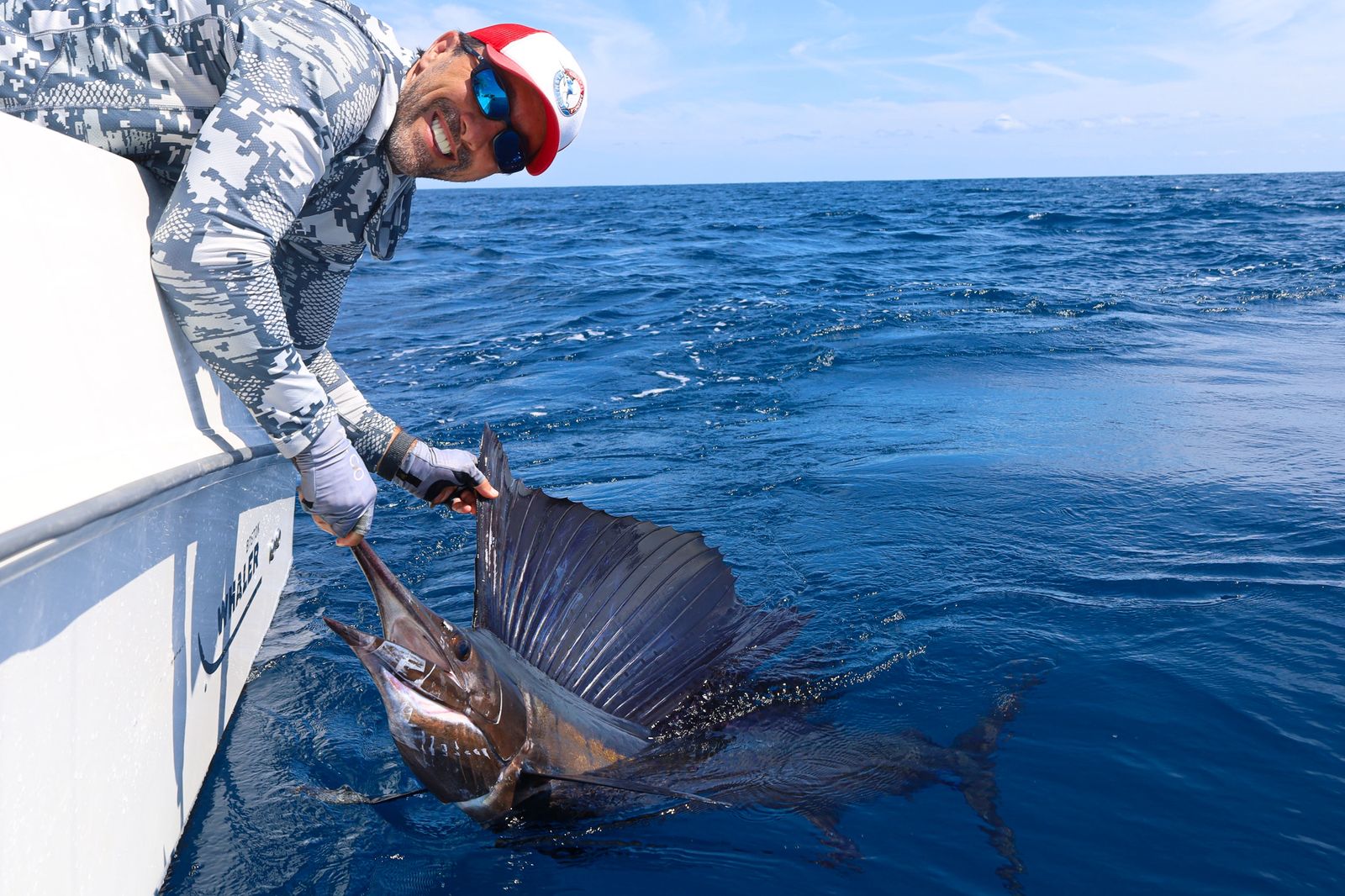 WhatsApp Image 2026-03-25 at 11.32.22 AM CAF owner, Chris Atkins, releases a sailfish at Crocodile Bay in Costa Rica